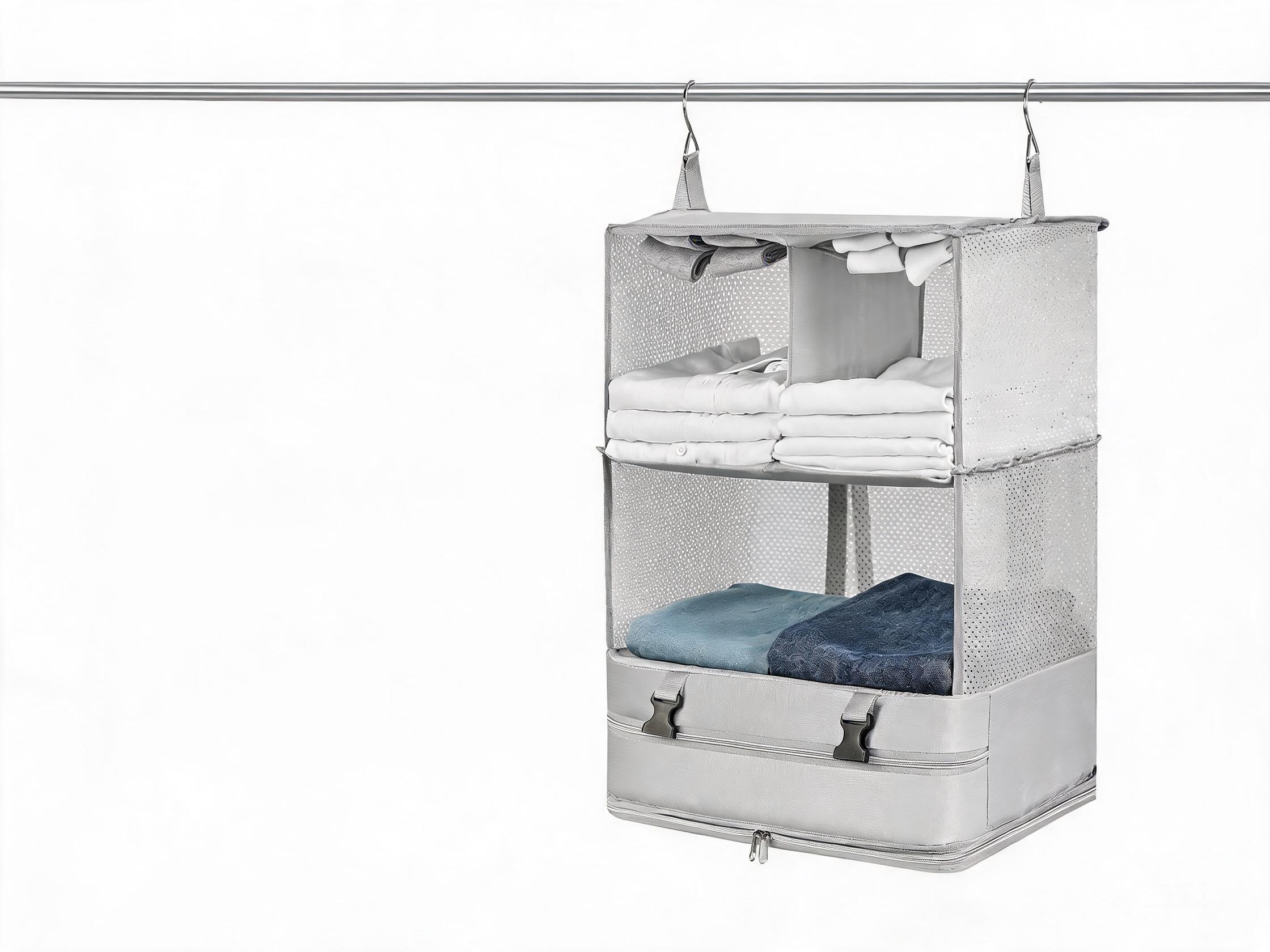 Hanging closet organizer with mesh sides and zippered bottom for folded clothes